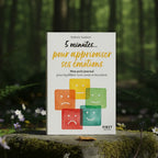 Livre 5 Minutes... pour Apprivoiser ses Emotions de Nathalie Saulnier posé sur un rocher en forêt, couverture blanche illustrée de carrés colorés avec des visages expressifs.