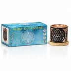 Coffret briques d'encens Aura Cleansing Aromafume, boîte bleue aux motifs paisley accompagnée d'un diffuseur d'encens en métal noir et cuivre.