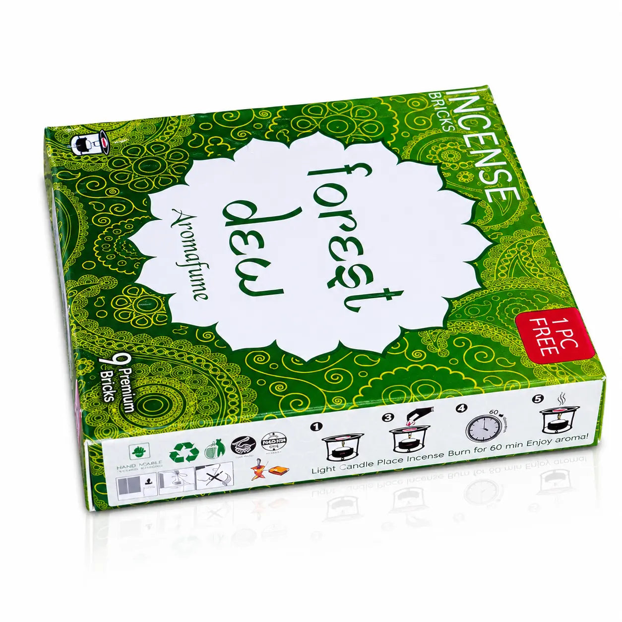 Briques d'encens Forest Dew Aromafume, packaging rectangulaire vert aux motifs paisley avec médaillon blanc central et tranche illustrant le mode d'emploi.