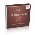 Briques d'encens Oliban (Frankincense) Aromafume, boîte cartonnée marron foncé ornée de délicates illustrations végétales claires au centre.