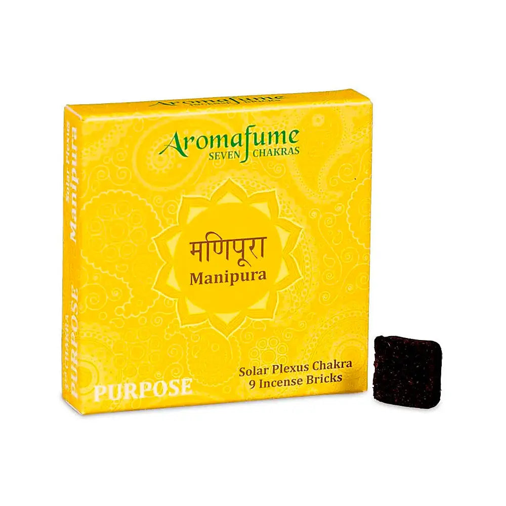 Encens en briques Aromafume, emballage jaune Manipura avec mentions « Seven Chakras » et « Solar Plexus Chakra 9 Incense Bricks », brique noire à côté.