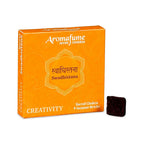 Coffret d’encens Aromafume orange motif mandala, inscription « Swadhistana » et « Creativity », « Sacral Chakra 9 Incense Bricks », une brique d’encens visible.
