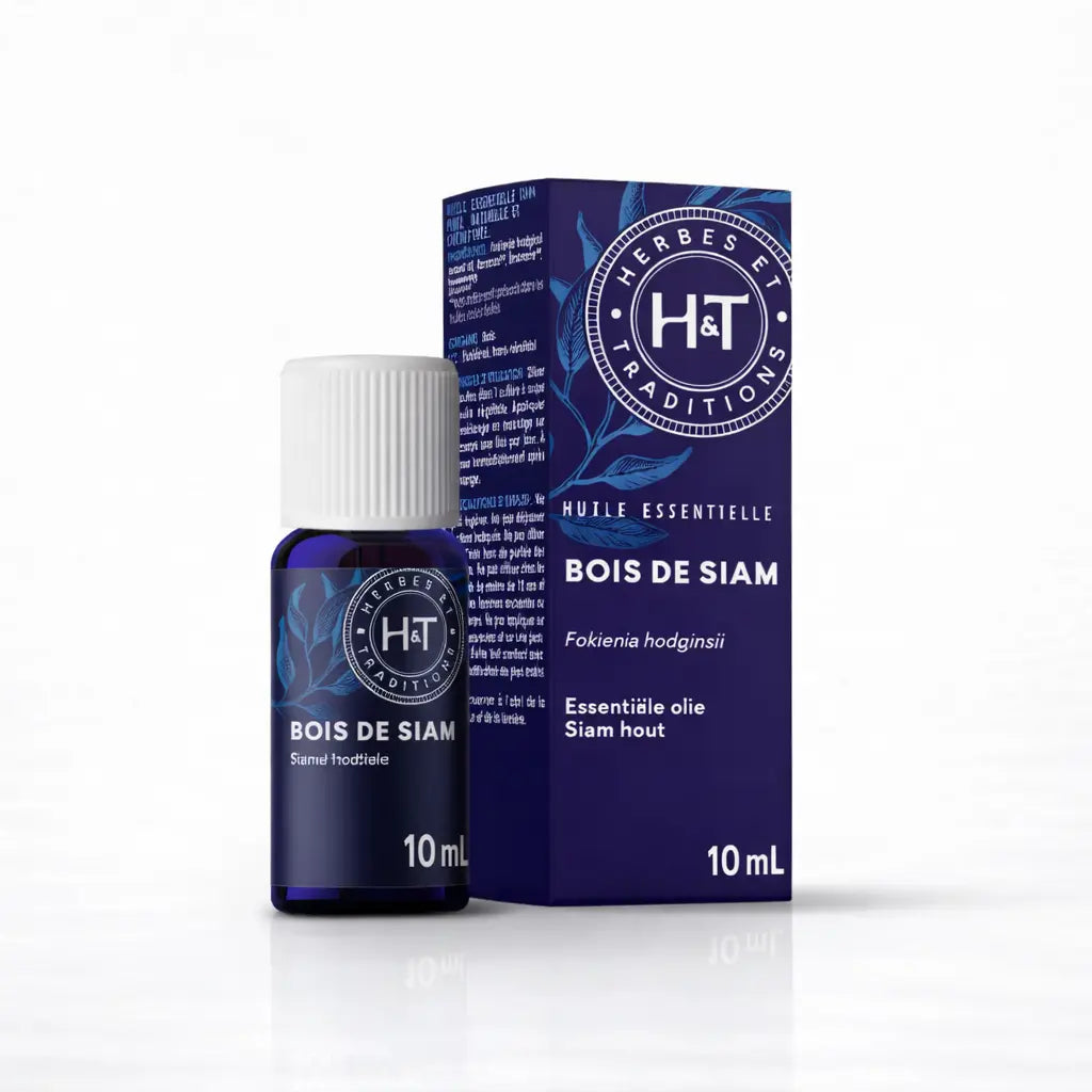 Un flacon de 10 ml d'huile essentielle de bois de siam de la marque Herbes & Traditions, accompagné de son étui en carton bleu foncé assorti, présenté sur un fond blanc.