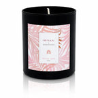 Bougie bijou Sensa x Nakupenda "Elle" dans un pot noir mat avec étiquette fleurie rose.