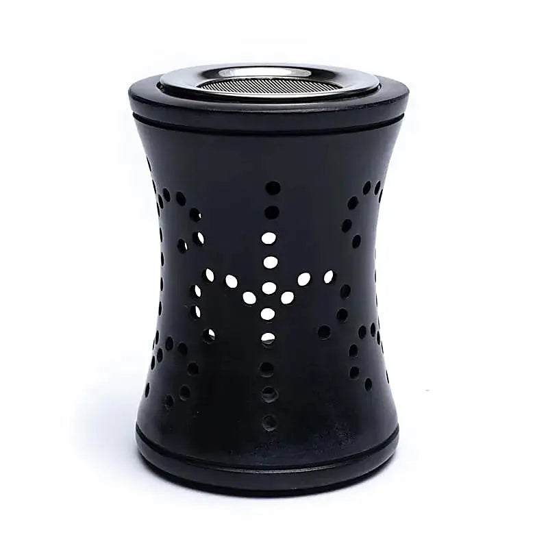Brûle-encens en stéatite noire ajourée, forme cylindrique évasée avec motif perforé en croix.