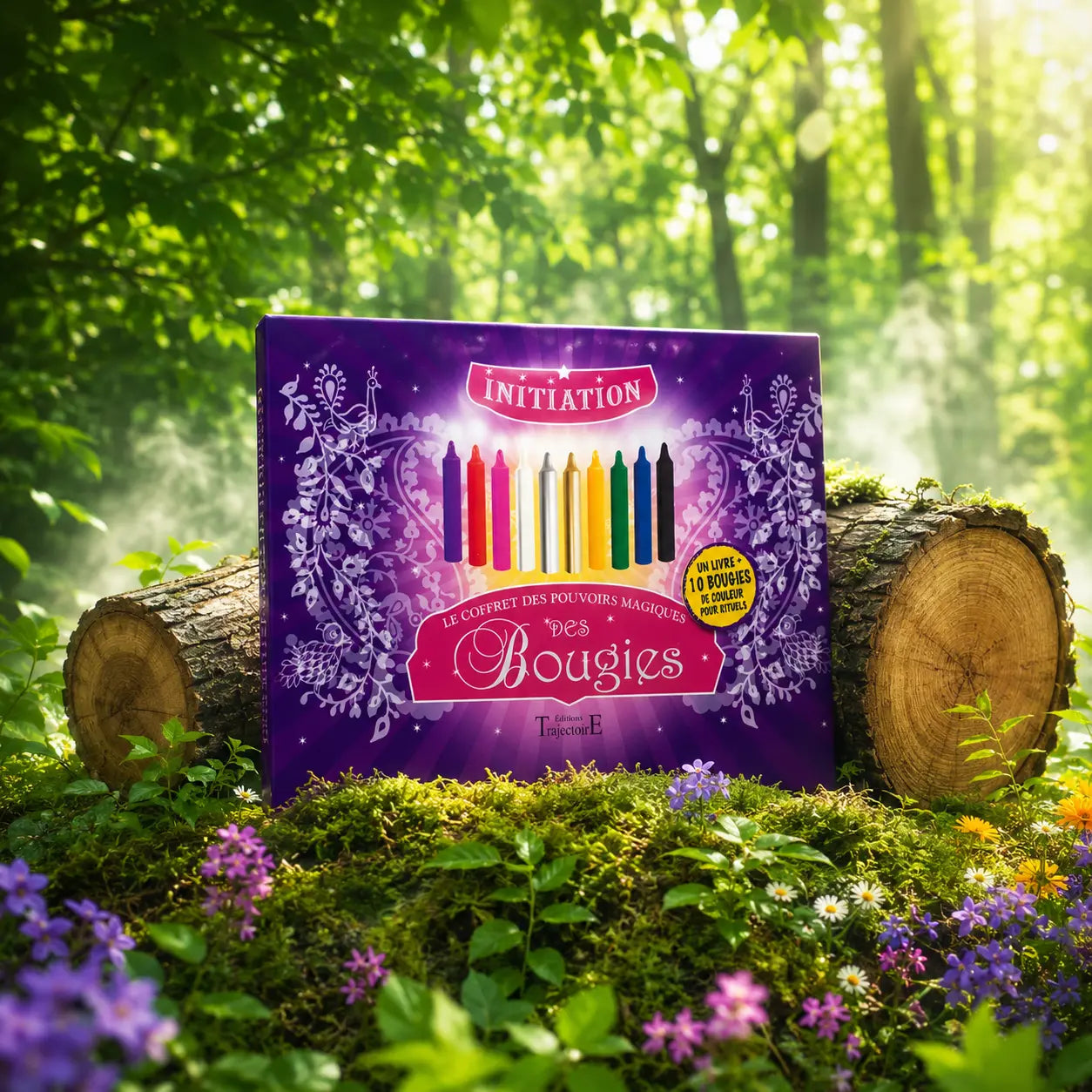 Livre Le Coffret des Pouvoirs Magiques des Bougies sur mousse sacrée au pied d'un arbre, entouré de fleurs violettes sous des rayons de soleil magiques.