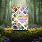 Livre Dictionnaire de Lithothérapie Holistique d'Aurélia Mariani posé sur une branche moussue, illustré d'une mosaïque géométrique de cristaux colorés.