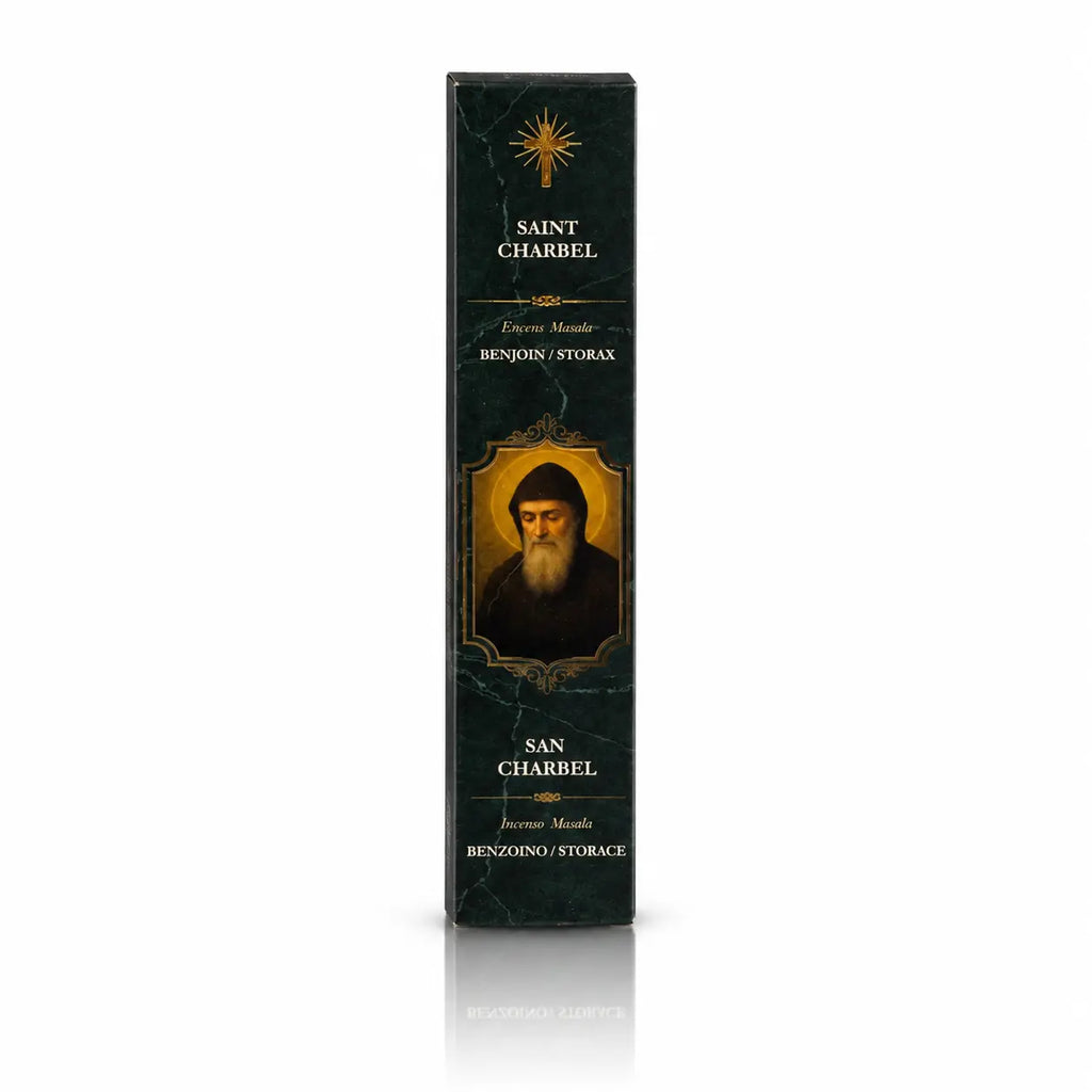 Encens religieux Saint Charbel conditionné dans un étui cartonné rectangulaire vert foncé marbré, orné du portrait du Saint, d'une croix rayonnante dorée et de lettrages blancs.