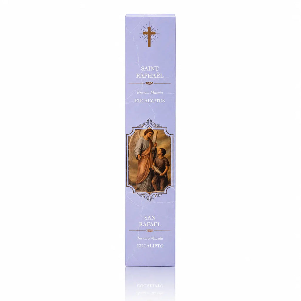Encens religieux Saint Raphaël présenté dans un étui cartonné rectangulaire mauve clair, illustré de l'archange avec un jeune homme sous une croix dorée avec des inscriptions blanches.