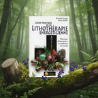 Livre blanc Guide Pratique de la Lithothérapie Energéticienne de Reynald Georges Boschiero posé sur une branche moussue, illustré d'un amas de pierres colorées, d'un schéma des chakras et de formes géométriques.