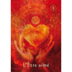 Carte « L’Être aimé » (n°5) de L’Oracle du Chaman Mystique, cœur lumineux tenu entre deux mains sur fond rouge.