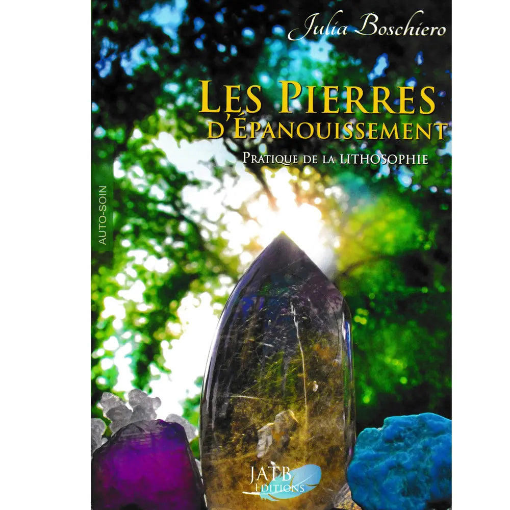 Couverture du livre "Les Pierres d'Épanouissement" de Julia Boschiero, illustrée par de grands cristaux (améthyste, quartz) mis en valeur devant une forêt lumineuse.