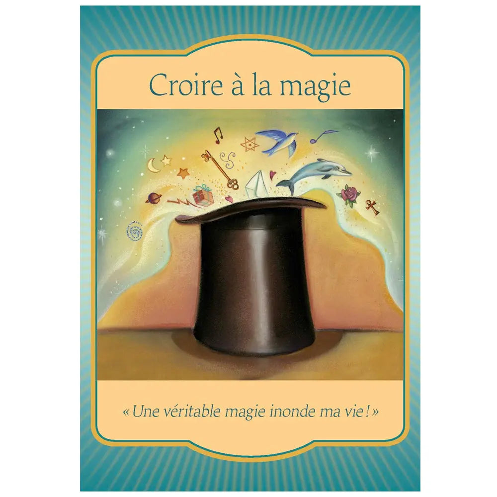Carte oracle « Croire à la magie » représentant un chapeau de magicien d’où s’échappent des symboles et objets (oiseau, dauphin, notes, étoiles), avec la citation « Une véritable magie inonde ma vie ! ».