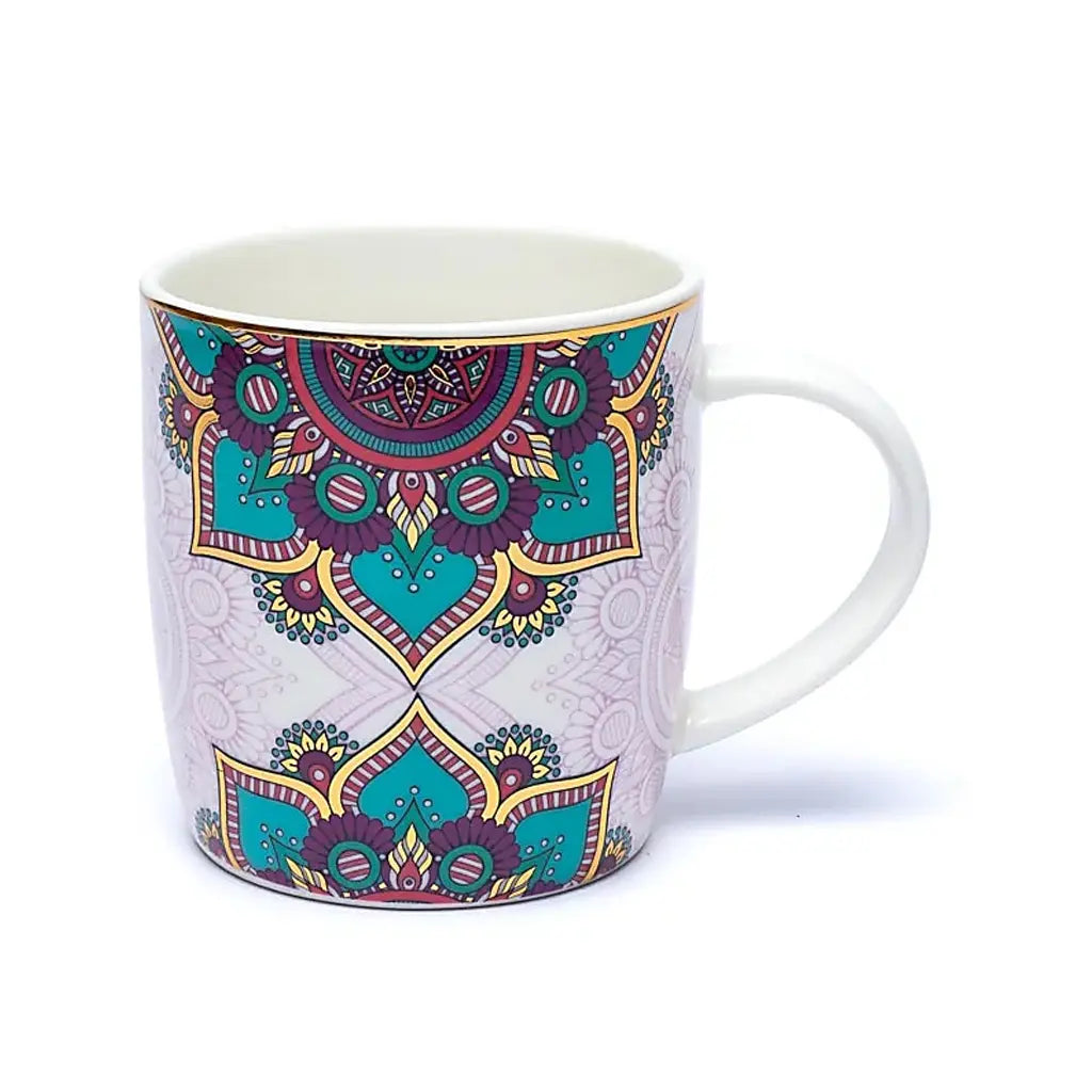 Tasse infuseur mandala turquoise doré en porcelaine blanche ornée de rosaces orientales colorées, finie par une anse arrondie et un liseré doré élégant.