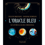 L'Oracle Bleu, coffret rigide noir orné d'un croissant de lune stylisé et de trois médaillons circulaires illustrant des personnages bleutés et oniriques.