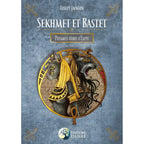 Couverture du livre Sekhmet et Bastet de Lesley Jackson, illustrant les deux divinités félines égyptiennes de profil dans un médaillon doré sur fond bleu texturé.