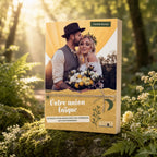Livre Votre Union Laïque de Camille Serres posé en forêt, illustré par la photo d'un couple s'embrassant lors d'une cérémonie en extérieur.